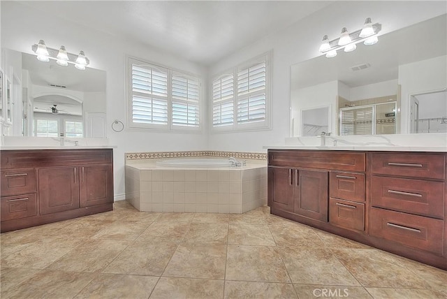 12790 Golden Leaf Dr, Rancho Cucamonga, CA 91739 - full bath featuring a shower stall, a bath, two vanities, and ceiling fan