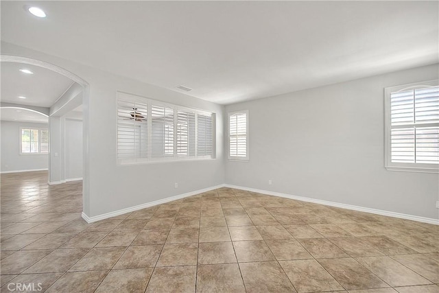 12790 Golden Leaf Dr, Rancho Cucamonga, CA 91739 - unfurnished room featuring arched walkways, light tile patterned floors, and recessed lighting