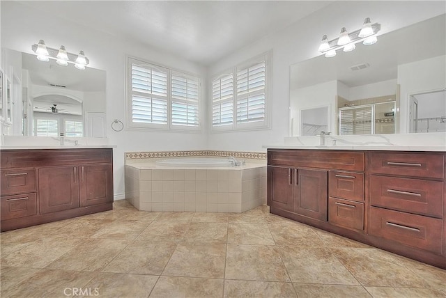 12790 Golden Leaf Dr, Rancho Cucamonga, CA 91739 - full bathroom with a shower stall, a bath, two vanities, and ceiling fan