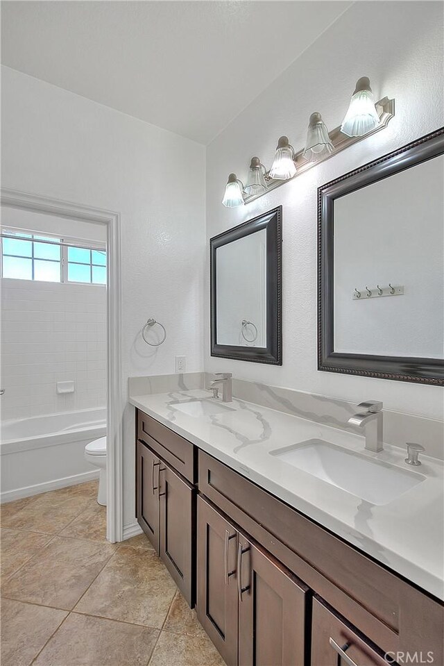 12790 Golden Leaf Dr, Rancho Cucamonga, CA 91739 - full bath featuring double vanity, tile patterned floors, and bathtub / shower combination