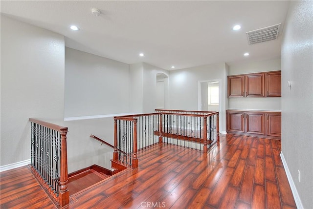12790 Golden Leaf Dr, Rancho Cucamonga, CA 91739 - hallway featuring an upstairs landing, dark wood finished floors, and recessed lighting