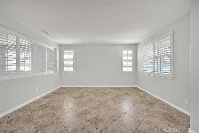 12790 Golden Leaf Dr, Rancho Cucamonga, CA 91739 - empty room with healthy amount of natural light and light tile patterned floors
