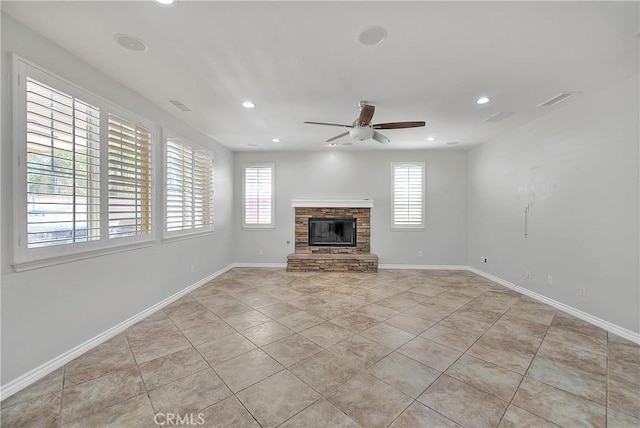 12790 Golden Leaf Dr, Rancho Cucamonga, CA 91739 - unfurnished living room with ceiling fan, light tile patterned floors, a glass covered fireplace, and recessed lighting