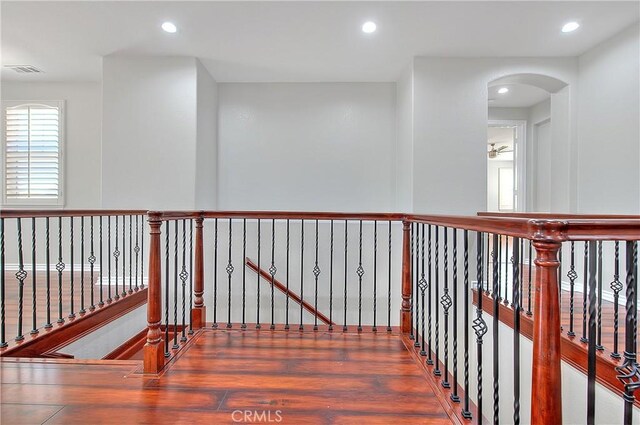 12790 Golden Leaf Dr, Rancho Cucamonga, CA 91739 - hall featuring wood finished floors, recessed lighting, and arched walkways
