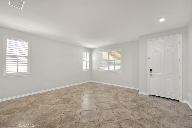 12790 Golden Leaf Dr, Rancho Cucamonga, CA 91739 - spare room with recessed lighting and light tile patterned floors