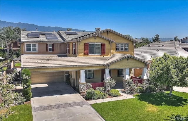 12790 Golden Leaf Dr, Rancho Cucamonga, CA 91739 - craftsman-style house featuring a porch, driveway, a front lawn, an attached garage, and roof mounted solar panels