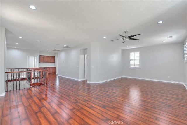 12790 Golden Leaf Dr, Rancho Cucamonga, CA 91739 - unfurnished living room with a ceiling fan, dark wood-style floors, and recessed lighting