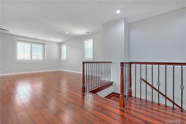 12790 Golden Leaf Dr, Rancho Cucamonga, CA 91739 - empty room with wood finished floors and recessed lighting