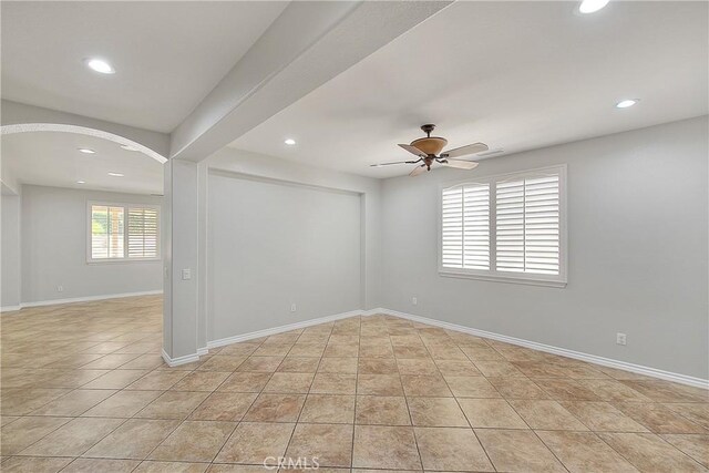 12790 Golden Leaf Dr, Rancho Cucamonga, CA 91739 - spare room featuring arched walkways, recessed lighting, ceiling fan, and light tile patterned flooring