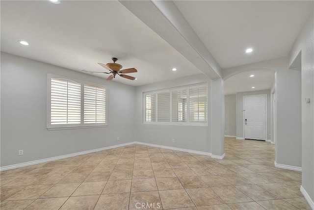 12790 Golden Leaf Dr, Rancho Cucamonga, CA 91739 - empty room featuring arched walkways, ceiling fan, recessed lighting, and light tile patterned flooring