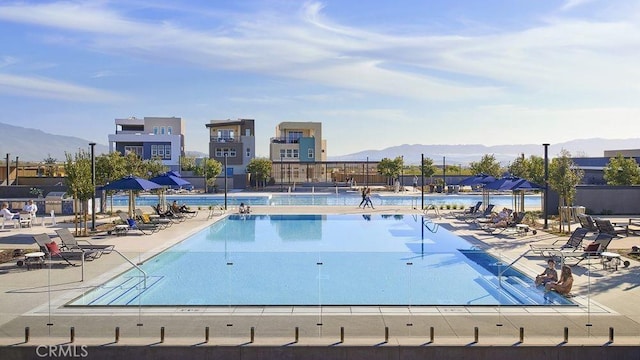 204 Lily Loop, Irvine, CA 92618 - community pool with a mountain view