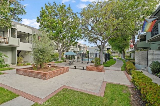 5110 E Atherton St Unit 57, Long Beach, CA 90815 - view of community with a residential view, a patio area, and a pool