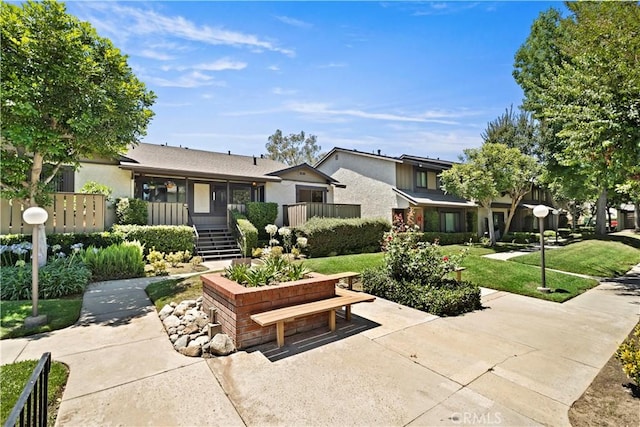 4366 Fairview Ave Unit 6, Arcadia, CA 91007 - view of front facade featuring stucco siding and a front lawn