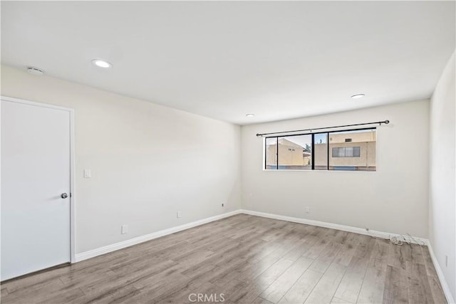 4366 Fairview Ave Unit 6, Arcadia, CA 91007 - unfurnished room with wood finished floors, recessed lighting, and a smoke detector