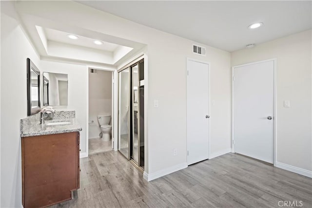 4366 Fairview Ave Unit 6, Arcadia, CA 91007 - full bath featuring vanity, wood finished floors, recessed lighting, and a raised ceiling