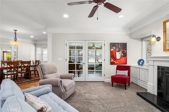 45 Covell Park Ave, Chico, CA 95926 - living room with recessed lighting, a fireplace with raised hearth, ceiling fan, ornamental molding, and carpet