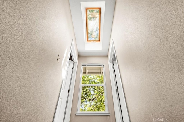 45 Covell Park Ave, Chico, CA 95926 - doorway to outside featuring a textured wall and a skylight