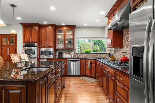 45 Covell Park Ave, Chico, CA 95926 - kitchen featuring stainless steel appliances, extractor fan, decorative backsplash, glass insert cabinets, and recessed lighting