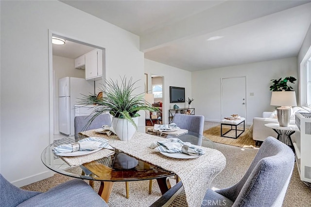 426 S Broadway, Redondo Beach, CA 90277 - dining room featuring baseboards and light carpet