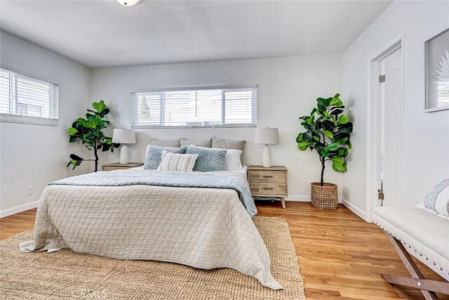 426 S Broadway, Redondo Beach, CA 90277 - bedroom with light wood-type flooring and baseboards
