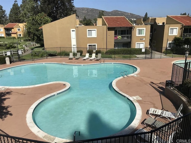 17189 W Bernardo Dr W Unit 103, San Diego, CA 92127 - community pool with a residential view, a mountain view, and a patio