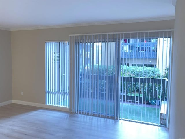 17189 W Bernardo Dr W Unit 103, San Diego, CA 92127 - spare room with wood finished floors and ornamental molding
