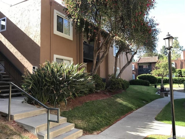 17189 W Bernardo Dr W Unit 103, San Diego, CA 92127 - view of community with stairs and a yard