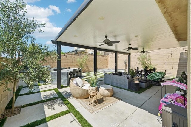 12400 Sarah Ct, El Monte, CA 91732 - fenced backyard featuring a patio, outdoor dining space, outdoor lounge area, and a ceiling fan