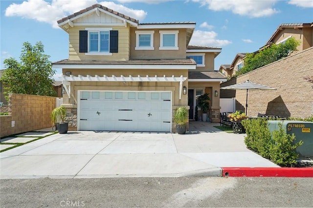 12400 Sarah Ct, El Monte, CA 91732 - traditional-style home featuring an attached garage, a tile roof, concrete driveway, stucco siding, and stone siding