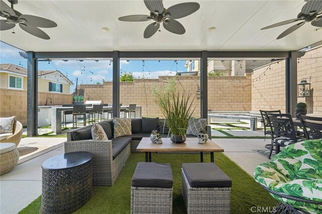 12400 Sarah Ct, El Monte, CA 91732 - view of patio / terrace with a ceiling fan, an outdoor living space, and outdoor dining space