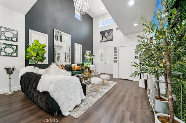 12400 Sarah Ct, El Monte, CA 91732 - living room featuring a high ceiling, a chandelier, wood finished floors, and recessed lighting