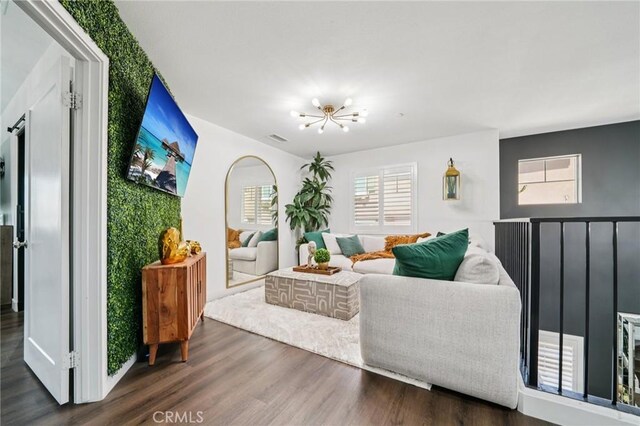 12400 Sarah Ct, El Monte, CA 91732 - living room with a chandelier and wood finished floors
