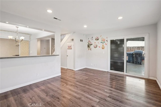 11052 1/2 Mcgirk Ave, El Monte, CA 91731 - unfurnished living room featuring recessed lighting, a chandelier, stairway, and wood finished floors