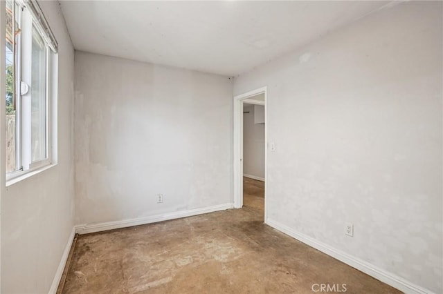 11052 1/2 Mcgirk Ave, El Monte, CA 91731 - unfurnished room featuring plenty of natural light and concrete flooring
