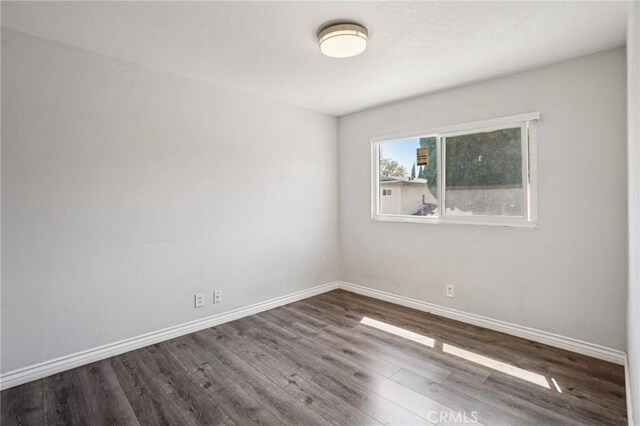 11052 1/2 Mcgirk Ave, El Monte, CA 91731 - empty room featuring wood finished floors and baseboards