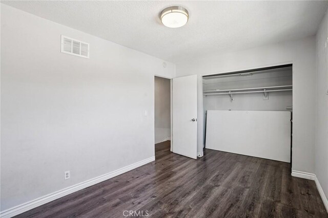 11052 1/2 Mcgirk Ave, El Monte, CA 91731 - unfurnished bedroom with wood finished floors and a closet
