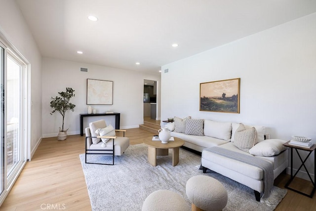 7830 Fairchild Ave, Winnetka, CA 91306 - living area with light wood-style flooring and recessed lighting