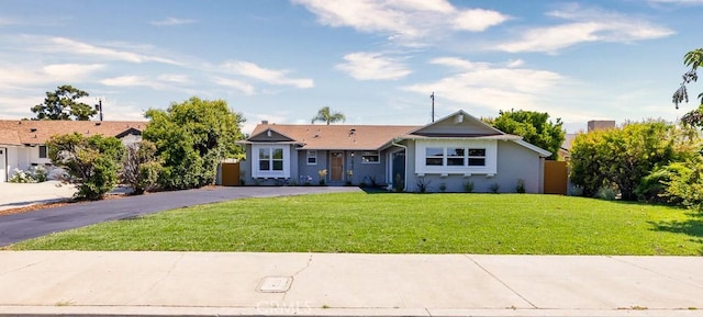 7830 Fairchild Ave, Winnetka, CA 91306 - single story home featuring asphalt driveway and stucco siding