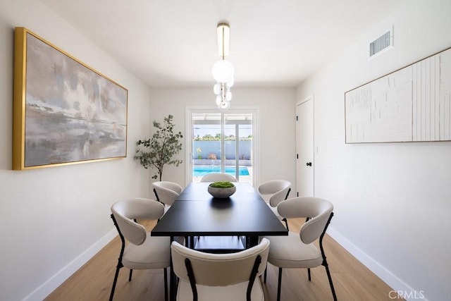 7830 Fairchild Ave, Winnetka, CA 91306 - dining space with light wood-type flooring and baseboards