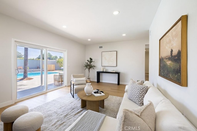 7830 Fairchild Ave, Winnetka, CA 91306 - living area with recessed lighting and wood finished floors