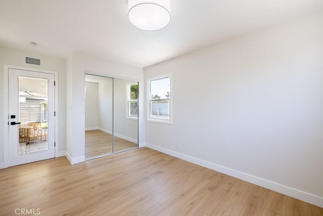 7830 Fairchild Ave, Winnetka, CA 91306 - unfurnished bedroom featuring light wood-style flooring and a closet