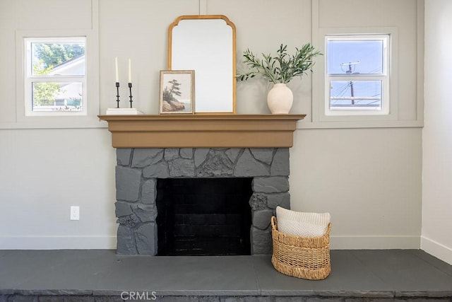 7830 Fairchild Ave, Winnetka, CA 91306 - detailed view of baseboards and a stone fireplace