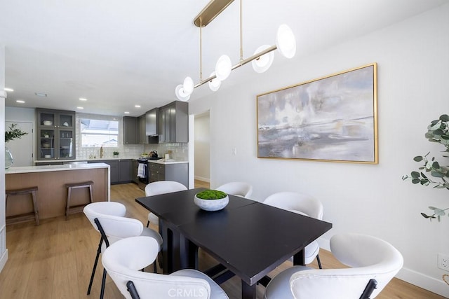 7830 Fairchild Ave, Winnetka, CA 91306 - dining room featuring light wood finished floors and recessed lighting