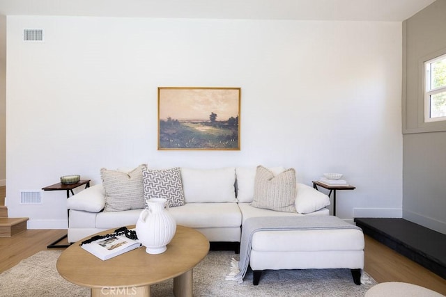 7830 Fairchild Ave, Winnetka, CA 91306 - living area featuring wood finished floors and baseboards