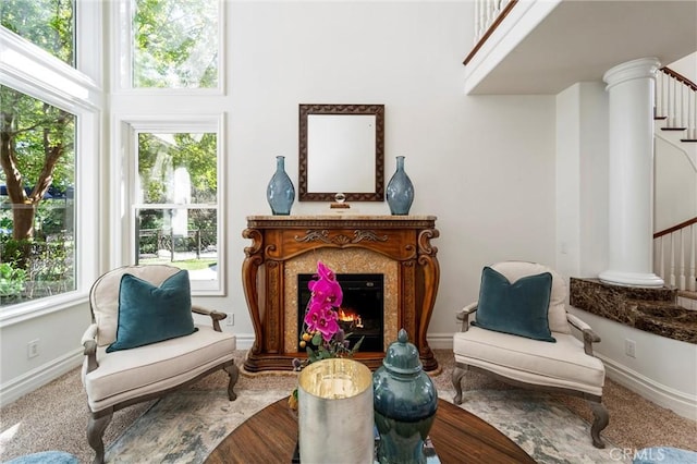 45200 Oak Manor Ct, Temecula, CA 92590 - sitting room with stairway, a towering ceiling, and a premium fireplace