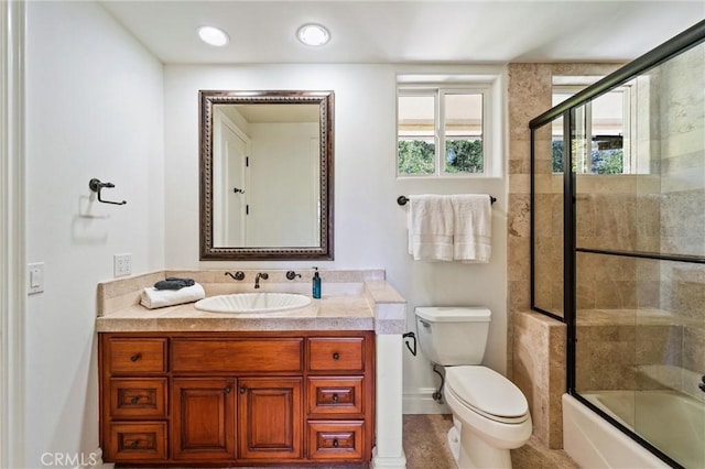 45200 Oak Manor Ct, Temecula, CA 92590 - bathroom featuring vanity and bath / shower combo with glass door