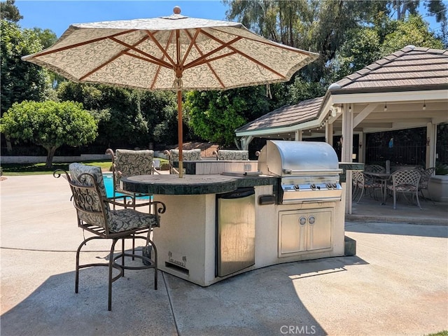 2622 Chauncy Pl, Riverside, CA 92506 - view of patio / terrace featuring exterior kitchen, an outdoor bar, and a gazebo
