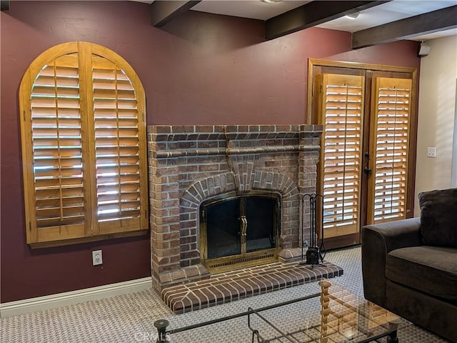 2622 Chauncy Pl, Riverside, CA 92506 - living area featuring beam ceiling, a fireplace, and carpet flooring