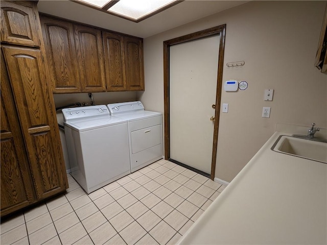 2622 Chauncy Pl, Riverside, CA 92506 - washroom with cabinet space, washer and dryer, and light tile patterned flooring