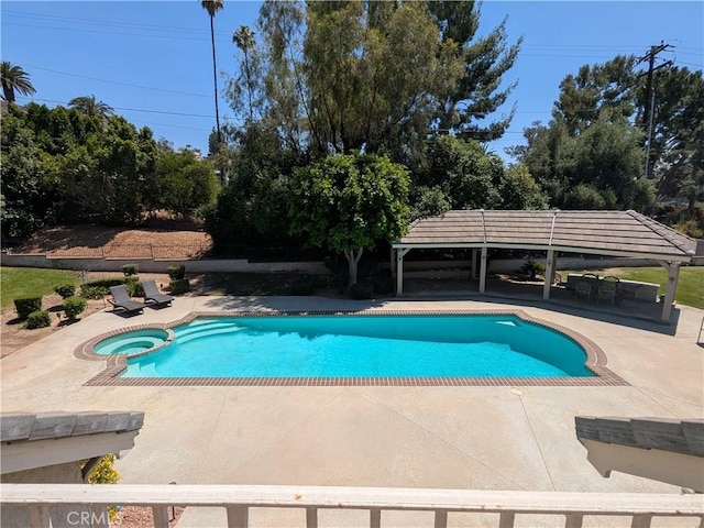 2622 Chauncy Pl, Riverside, CA 92506 - view of swimming pool with a pool with connected hot tub, a gazebo, and a patio